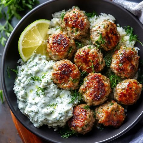 Greek Turkey Meatballs | Delicious Tzatziki Sauce Healthy Greek Turkey Meatballs With Tzatziki, Greek Turkey Meatloaf, Greek Turkey Recipes, Greek Chicken Meatballs With Homemade Tzatziki, Greek Chicken Meatballs With Tzatziki, Greek Turkey Meatball Bowls, Turkey Meatball Meals, Turkey Meatball Dinner, Turkey Greek Meatballs