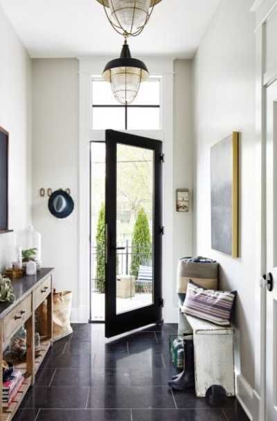 53 Modern Farmhouse Entry & Mud Room Ideas | Sebring Design Build Subway Tile Floor, White Mudroom, Farmhouse Bungalow, Front Entryway Ideas, Lake Farmhouse, Bungalow Farmhouse, Coastal Cozy, Industrial Hanging Lights, Mudroom Flooring