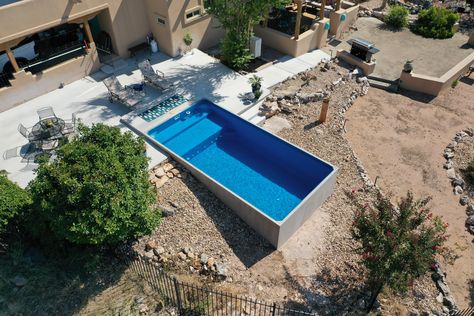 Reclaiming unusable land: Using a Plungie pool to make the best of a difficult block Pools With Retaining Walls Sloped Backyard, Pool Retaining Wall, Hillside Pool, Best Pools, Build Dream Home, Sloped Yard, Pool Shapes, Sloped Backyard, Round Pool