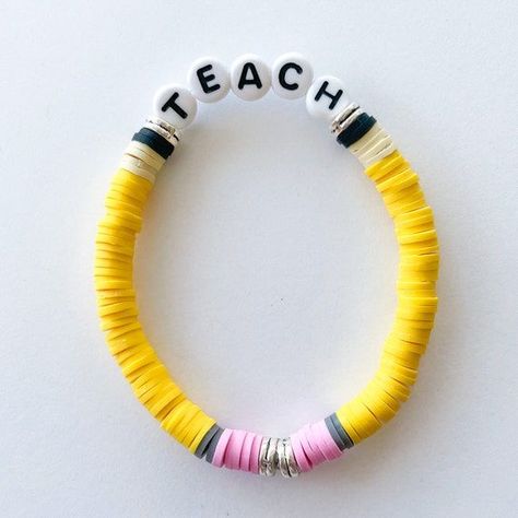 Pin on I want... Clay Bracelet Ideas, Clay Bead Ideas, Teacher Bracelet, Clay Bead Bracelet Ideas, Heishi Bracelets, Bracelet Business, Bead Bracelet Ideas, Clay Bead Bracelets, Clay Bead Necklace