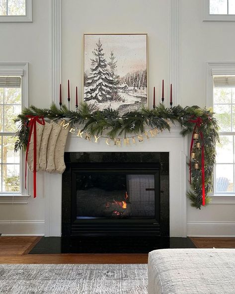 Christmas Mantle Artwork, Stockings On Wall, Mantle Christmas Garland, Mantel Christmas Decorating Ideas, Fireplace Garland Christmas, Mantle Christmas Decor Ideas, Garland On Mantle, Christmas Fireplace Decor Ideas, Farmhouse Christmas Mantle