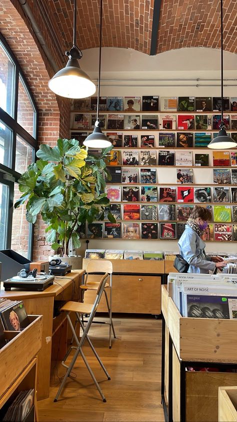 Vintage Music Store Aesthetic, Industrial Interior Aesthetic, Record Shop Interior Design, Vinyl Records Coffee Shop, Coffee Shop Room Aesthetic, Art And Coffee Shop, Book And Coffee Shop Aesthetic, Record Shop Interior, Vinyl Cafe Design