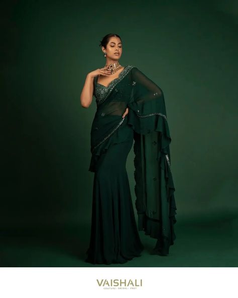 The featured dark green pre-draped saree showcases exquisite ruffles and intricately handcrafted cutwork border. The embroidery seen on the saree features sequin and cutdana work. Here it is elegantly paired with a fully embroidered green blouse. #vaishaliagarwal #inarabyvaishali #couturecocktailcollection #summerweddingshyderabad Dark Green Saree Look, Dark Green Saree, Cutdana Work, Draped Saree, Drape Saree, Green Saree, Saree Look, Green Blouse, Cut Work