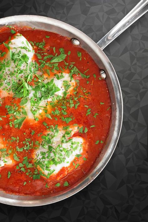 This Whole30-friendly Poached Cod in Tomato Sauce is so simple and delicious! You can get it on the table in just a few minutes on a busy weeknight! Fish With Marinara Sauce, Cod With Marinara Sauce, Cod In Tomato Sauce, Poached Cod, Poached Fish, Paleo Fish, Nom Nom Paleo, Sauteed Zucchini, Buzzfeed Tasty