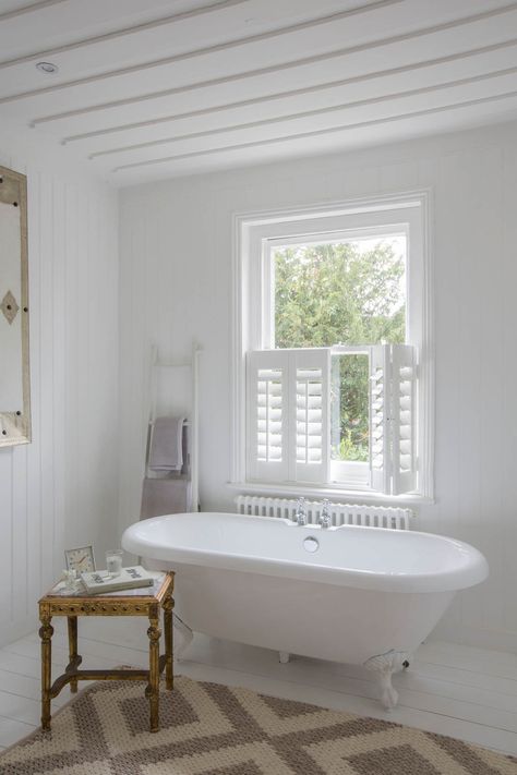 Cafe style interior wooden shutters in bathroom | Making the most of your windows | Luxaflex shutters | Apartment Apothecary Window Shutters Indoor, Shutters Indoor, Bathroom Window Coverings, Cafe Shutters, Cafe Style Shutters, Indoor Shutters, Bathroom Window Treatments, Interior Window Shutters, Bathroom Blinds