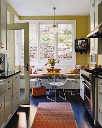 until tomorrow: galley kitchen  bertoia  wire chairs, built-in breakfast nook and schoolhouse pendant. Kitchen Banquette, Kitchen Table Chairs, Dining Room Seating, Dining Room Combo, Banquette Seating, Kitchen Benches, Small Space Kitchen, Galley Kitchen, Cozy Kitchen