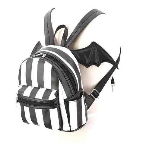 Bat Wing Strip Mini Backpack Features: High Quality Vinyl Material And Uniquely Designed, Zippered Closure For Main Compartment, 1 Zippered Outside Pocket, 2 Side Pockets, Fabric Lined Interior, 1 Zippered Inside Pocket, Adjustable Backpack Straps Measurements: Measures Approximately 9.5in(L) X 6.5in(W) X 10in(H) Weighs Approximately 1lb Mini Mochila, Bat Wing, Backpack Straps, Car Charms, Animal Jewelry, Mini Backpack, Goth Fashion, Bat Wings, Zipper Pouch