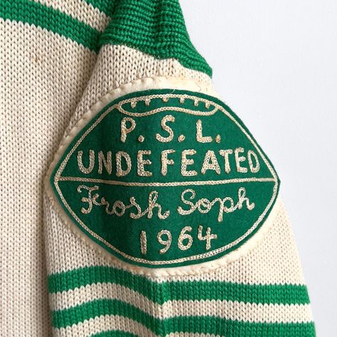 Vintage 1960s Walthers Lutheran High School Varsity Football Letterman Cardigan Sweater

Recommended size: Medium
Chest: 21" | Length: 30"
Full Sleeve: 25"
Tag: Logan Knitting Mills of Chicago, Illinois
Material: 100% Pure Wool (Dry Clean Only)
Features a range of great chenille patches from the large 'W' and numbers '68' on the front, and a big horse patch on the backside. Also features an all pure wool blend of off white and bright green fibers. Has some wear/spots around the cuffs and underarms but no tears.

*Please expect normal signs of wear and use as this item is in vintage condition (20+ years old). All sales final.

#vintagecardigan #vintagelettermancardigan #60scardigan #60s #retro