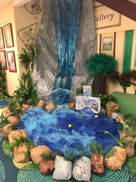 River Display Classroom, Rainforest Stage Design, Rainforest Room Transformation, Book Fair Ideas Display, Moana Decor, Diorama Tropical Rainforest, Jungle Book Stage Design, Amazon Rainforest Classroom Display, Jungle Vbs