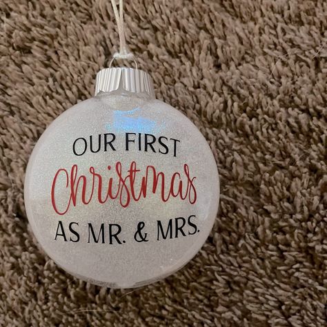 Brand New, Handmade And Customized- 3 Inch Plastic Round Disc Ornament With White Glitter On Inside And Black/Red Vinyl “Our First Christmas As Mr. And Mrs.” Text On Outside! Questions? Just Ask! Christmas Ornament Vinyl, Vinyl Christmas Ornaments Cricut, Vinyl Projects Christmas, Christmas Ornaments Resin, Christmas Cricut Ornaments, Christmas Ornaments Diy Cricut, Cricut Ornaments Diy, Christmas Ornaments Cricut, Popular Ornaments