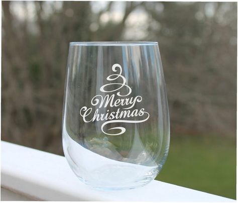 Etched Stemless Wine Glass - Etched with Christmas design as shown. These etched stemless wine glasses are perfect for any occasion. Holds 17oz. All of our glassware is sandblasted and handmade by us in our studio. Sandblasting is a technique used to engrave on many different surfaces Diy Christmas Gifts Cricut Glass Etching, Christmas Wine Glasses Etched, Cricut Etching, Laser Christmas, Custom Whiskey Glasses, Etching Ideas, Christmas Wine Glasses, Wine Christmas, Etched Wine Glasses