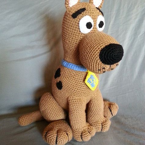 Here is a nother Scooby Doo I made. He has been slightly revised but stand about 16 inches.  https://www.etsy.com/shop/MammaBearCreations?ref=pr_shop_more  https://m.facebook.com/BeautifulBears4U?ref=bookmark  #Scooby #handmade #gifts #mysterydog #cuddle Scooby Doo Crochet Pattern Free, Crochet Scooby Doo Pattern, Crochet Scooby Doo, Scooby Doo Crochet, Crochet Scooby Doo Amigurumi Free Pattern, Crochet Dog Patterns, Easy Crochet Animals, Crochet Disney, Crochet Baby Toys