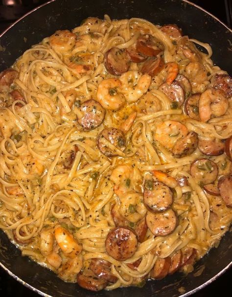 A spicy and creamy Cajun pasta dish with blackened shrimp and andouille sausage. Cajun Shrimp Pasta With Sausage, Cajun Pasta Recipes, Shrimp And Sausage Pasta, Creamy Cajun Shrimp Pasta, Pasta With Shrimp, Cajun Shrimp Pasta, Pasta With Sausage, Creamy Shrimp, Cajun Pasta