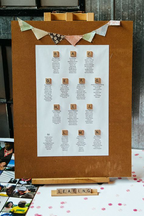 beautiful touches at airship37-Scrabble Seating Chart Board Game Wedding Seating Chart, Scrabble Seating Chart, Scrabble Wedding Ideas, Scrabble Wedding Decor, Scrabble Table Numbers, Wedding Scrabble, Board Game Wedding, Scrabble Wedding, Scrabble Crafts