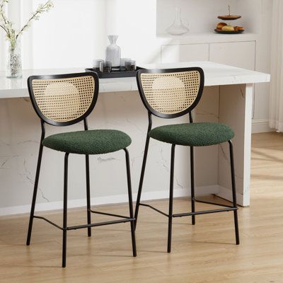 Elevate the elegance of your dining space with our chic rattan stools, which effortlessly blend modern sophistication and enduring appeal. The black metal frame adds a sleek and contemporary touch, while the synthetic rattan backrest introduces a natural, refined element. The stools are upholstered in Boucle fabric, offering a variety of color options, including White, Black, and Dark Green, to suit your individual style preferences. Whether you're furnishing an elegant home, dining room, kitche Mid Century Modern Barstools, Boutique Restaurant, Bar Stools For Kitchen, Green Bar Stools, Mid Century Bar Stools, Rattan Counter Stools, Apt Decor, Home Dining Room, Rattan Stool