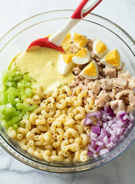 This creamy Tuna Pasta Salad recipe is served with macaroni, eggs, celery, onions, peas, and of course- tuna fish. This makes an easy lunch, snack, or side dish that is pulled straight from the fridge and served cold! Tuna Mac Salad, Creamy Tuna Pasta Salad, Easy Marinated Chicken, Tuna Salad Recipe Easy, Macaroni Salads, Tuna Pasta Salad Recipes, Tortilla Soup Easy, Tuna Macaroni Salad, Creamy Tuna Pasta