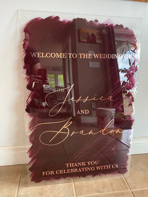 Custom Rosegold Chrome Vinyl on Painted Acrylic Wedding sign, that was hung from our rentable copper frame: https://www.exclusiveinvites.ca/rentals . . . #burgundywelcomesign #rosegoldwelcomesign #burgundyandrosegold #weddingwelcomesign #welcometoourwedding #acrylicweddingsigns Burgundy Wedding Welcome Sign, Burgundy Wedding Sign, Wedding Board Design, Diy Wedding Entrance, Surprise Anniversary Party, Wedding Cricut, Wedding Decorations Flowers, Wedding Entrance Sign, 11 Year Anniversary