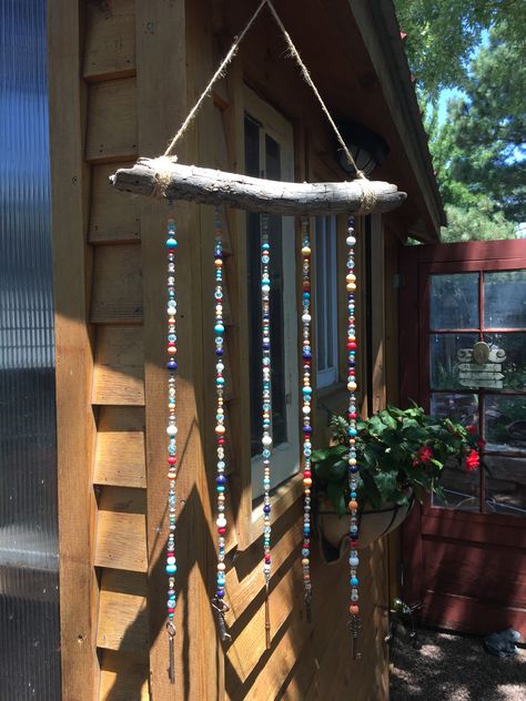 Old keys hung on a stick with beaded wire Stick With Beads Hanging, Stick Wind Chime, Windchimes Homemade, Wind Charm, Porch Leaners, Bored Board, Old Keys, Diy Wind Chimes, Daycare Crafts