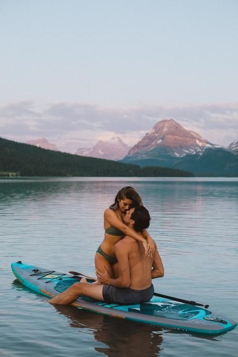 Chloë Chapdelaine and Hamish Hazelden paddle boarding on Bow Lake along the Icefields Parkway. couple paddleboarding photoshoot, mountain couple's session, banff national park, sunset, water, lake, bow lake, glacier lake, engagement, couple goals, adventure, travel, evie swim, water photoshoot, swimsuit Paddle Board Couple Pictures, Athletic Couple Photoshoot, Boat Engagement Photos, Catherine Cowles, Camping Photoshoot, Boat Engagement, Paddle Boarding Pictures, Green Flags, Mountain Couple