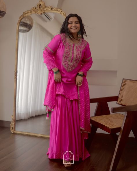 Radhika Bhardwaj Prakash in Pink City Rani Pink, a colour more popularised as Hot Pink, is as old a colour as is Indian fashion. It was much later that the world popularised it as hot pink and fuchsia. But the roots of it lie in India, with an essence of gulaal. Here, @_anandhika.official is wearing a rani pink bandhani sharara set with heavy zari embroidery on the yoke, accented with colourful resham work, gota embroidery and subdued pearls. Paired with an embroidered bandhani dupatta, th... Bandhani Sharara, Pink Indian Outfit, Garara Dress, Gota Embroidery, Wedding Fits, Bandhani Dupatta, Rani Pink, Resham Work, Zari Embroidery