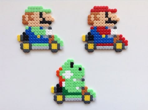 Mini Mario Kart- Hama Bead Art by Dogtorwho Perler Beads Mario Kart, Mario Melty Beads, Mario Hama Beads Pattern, Perler Bead Tiny Patterns, Mario Kart Perler Beads, Mario Kart Pixel Art, Mario Kart Art, Mario Perler Bead Patterns, Perler Beads Mini