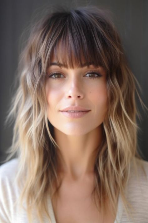 Embrace the shaggy long layers with fringe for a relaxed and bohemian look. This layered haircut is ideal for thick hair, offering movement and dimension. Click here to check out more layered haircuts and hairstyles for long hair. Long Hair Framed Face Haircuts, Womens Hair With Bangs, Shaggy Long Hair, Blonde Hair Transformations, Hairstyles For Medium Length Hair, Long Hair With Bangs, Haircut And Color, Medium Length Hair, Hairstyles For Long Hair