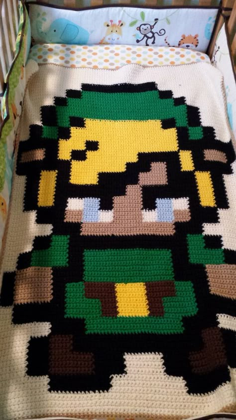 Legend of Zelda Pixel Link Crochet Blanket Zelda Crochet Blanket, Legend Of Zelda Crochet, 8 Bit Crochet, Zelda Crochet, Nintendo Crochet, Crochet Game, Geeky Craft, Geek Crafts, Pixel Crochet