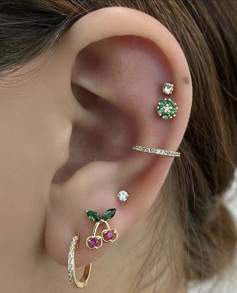 Ear Piercing Ideas Colorful, Colourful Ear Piercings, Ear Art Piercings, Colorful Ear Piercings, Ear Piercing Inspo Aesthetic, Colorful Earring Stack, Themed Ear Piercings, Cool Ear Piercings Unique, Pretty Ear Piercings Unique