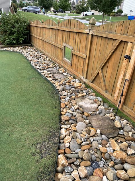 Rock border along fence line | Lawn Care Forum Rock Border Along Fence, Fence Edge Landscaping, Fence Border Landscaping, Rock Drainage, Fence Gardening, Border Landscaping, Fence Edging, Backyard Aesthetic, Fence Border