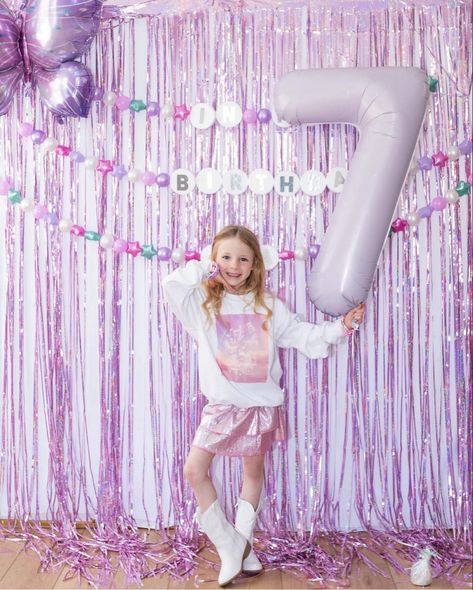 Taylor Swift birthday party for a 7 year old girl. Backdrop with friendship bracelet garland that says In my Birthday Era. Taylor Swift Birthday Pictures, Taylor Swift Birthday Party Outfit, Taylor Swift's Birthday Party, Taylor Swift Birthday Photoshoot Ideas, Taylor Swift Enchanted Birthday Party, Different Taylor Swift Eras, Taylor Swift Birthday Outfit Kids, Taylor Swift Birthday Party Outfit Ideas, Taylor Swift Activity Sheet