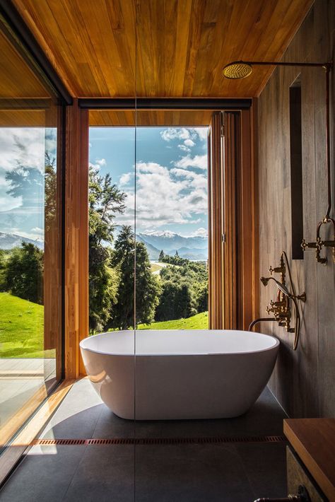 Dwell’s Top 10 Home Tours of 2019 - Dwell Rammed Earth, Earth Homes, Rustic Bathroom, Wall Fixtures, Work Week, Free Standing Tub, Beautiful Bathrooms, Concrete Floors, Bathroom Inspiration