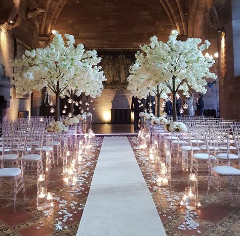 Wedding Venues Cherry Blossom, Elegant Wedding Isles, White Cherry Blossom Wedding Decor, Isle Decorations Wedding, Wedding Isles Decoration, Cherry Blossom Wedding Centerpieces, Wedding Aisle Candles, Blossom Tree Wedding, Peckforton Castle