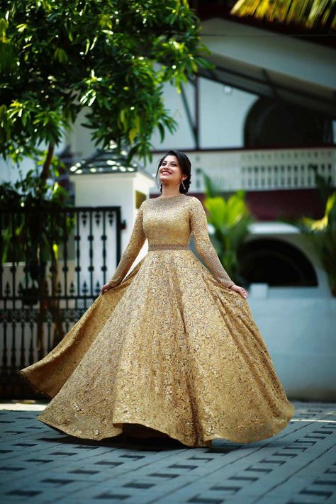 Golden Gown with covered neck and full sleeve Simple Gown Designs, Golden Ball Gown, Full Sleeve Gowns, Christian Wedding Gowns, Silk Bridal Gown, Beautiful Frocks, Golden Gown, Silk Wedding Gown, Reception Outfit