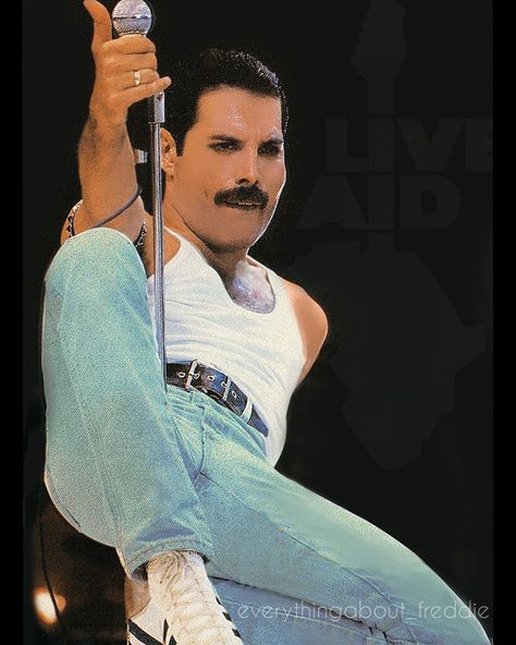 Freddie Mercury Live Aid  Iconic pose Freddie Mercury Aids, Freddie Mercury Live Aid, Queen Live Aid, Fred Mercury, Queen Live, Mr Bad, Madonna Photos, Live Aid, Borhap Cast