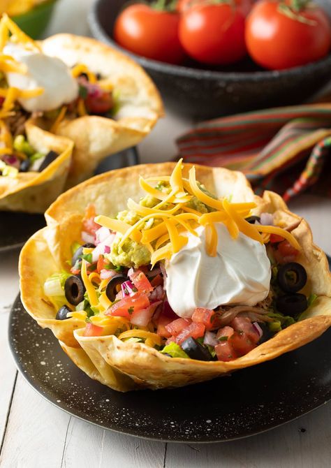 Make Amazing Taco Salad Recipes at home with these ultra-crispy Bubbly Taco Salad Bowls! Learn How To Make Tortilla Bowls just like your favorite Mexican restaurant. #ASpicyPerspective #taco #salad #tortilla #bowls #tacosalad #texmex #mexican #crunchy #cincodemayo How To Make Taco Salad Shells, Taco Salad Bowl Recipe, How To Make Taco Bowls, How To Make Taco Salad Bowls, Homemade Taco Bowls, Taco Salad Shells Tortilla Bowls, Taco Bell Taco Salad, Taco Salad Cups, Tortilla Bowls Recipes