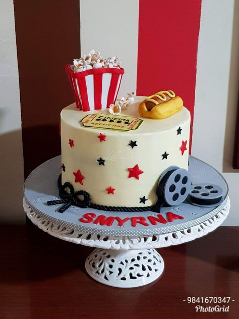 Movie theme cake #Nofondantcake #Buttercreamcake  For a Movie buff with Movie Ticket, Movie Reel and her favourite Popcorn and Hotdog ...  Cake Flavor: Chocolate truffle cake covered in buttercream with fondant accent Birthday Cake Movie Theme, Movie Theme Cake Ideas, Movie Reel Cake, Bollywood Theme Cake, Movie Night Cake Ideas, Movie Theater Cake, Movie Night Cake, Cinema Cake, Nicholas Party