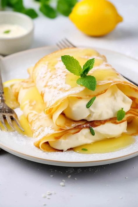 Lemon Ricotta Crepes - BeCentsational Fall Crepes, Ricotta Filling For Crepes, Crepes Recipe Easy Filling, Lemon Poppyseed Crepes, Lemon Ricotta Crepes, Lemon Crepes Filling, Lemon Crepes Recipe, Lemon Ricotta Crepe Filling, Lemon Curd Crepes