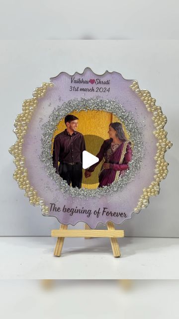 Kajal shah on Instagram: "Our another best seller resin photo frame😍

Size:- 8inch
Price:- ₹1100/- free shipping
Comes with wooden stand.
(For metal stand ₹150/- extra)

Making & delivery time 15-20days

Can be customised according to your choice
DM TO ORDER on WhatsApp- 8866726122

#resin #resinart #resinphotoframe #resinphotoframes #resingifts #birthdaygift #anniversarygift #uniquegifts #photoframe #giftsforher #giftsforhim #personalisedgifts #processvideo #reels #reelsinstagram #viralvideos #trendingaudio #newaudio #reelsinstagram" Photo Frame Resin Art, Resin Photo Frame, Resin Photo, Resin Crafts Tutorial, Resin Frame, Anniversary Photos, Metal Stand, Wooden Stand, Golden Color