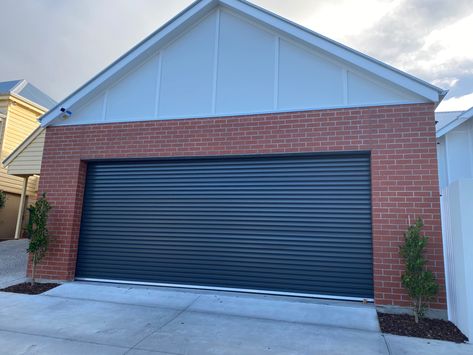 Red brick garage with black monument door, white trim and galv (zincalume) roof Red Brick Black Garage Door, Red Brick House Interior, Red Brick Garage, Zincalume Roof, Brick House Interior, Clinker Brick House, Brick Garage, Lakehouse Exterior, Black Garage Door