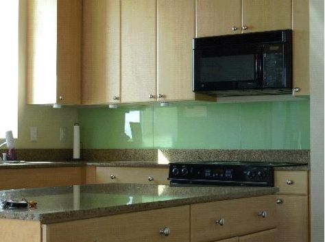 Back Painted Glass Backsplash - Ikea Hack style.  Normally it is very expensive to have a custom made glass backsplash, but this person used their thrifty skills to create the same look for much less. Props! Hack Style, Glass Shelves Ikea, Backsplash Diy, Glass Kitchen Backsplash, Paint Backsplash, Chalk Ideas, Farmhouse Backsplash, Back Painted Glass, Beadboard Backsplash