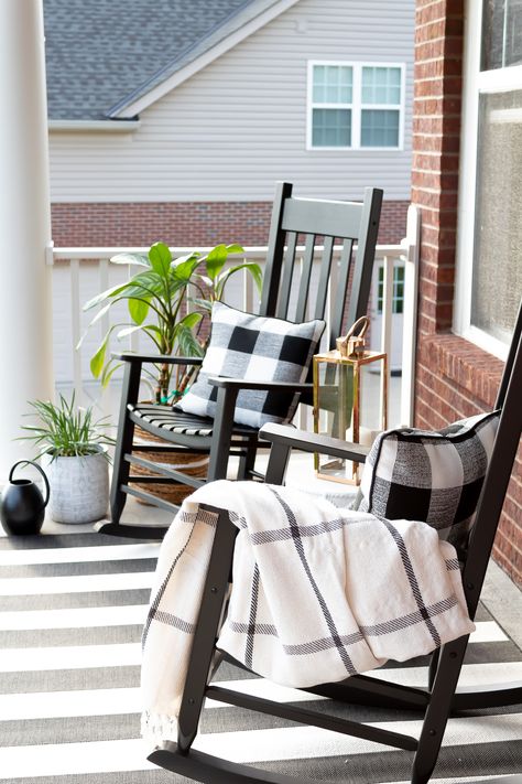 Learn 5 essential steps to creating a gorgeous put together front porch. Black and white porch decor. Buffalo check pillows. Black and white striped outdoor rug. Black and white outdoor decor. Black rocking chairs. Classic front porch decor. Front Porch Furniture, Rocking Chair Front Porch, Porch Landscaping, White Porch, Front Porch Makeover, Rocking Chair Porch, Porch Makeover, Farmhouse Front Porches, Porch Furniture