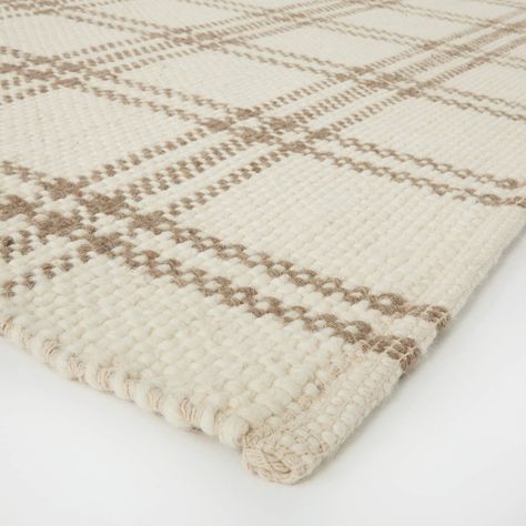 Transform your floor space with this Neutral Cottonwood Plaid Wool and Cotton Area Rug from Threshold™ designed with Studio McGee. This handmade Goodweave certified area rug is a great indoor accent and showcases a woven plaid pattern in neutral colors for casual texture and classic appeal. The wool and cotton construction adds comfort and warmth to your flooring for a great feel underfoot. Plus, it has a flat pile height that's perfect for frequently used areas like your living room, hallway or Mcgee Target, Studio Mcgee Target, Plaid Rug, Rug Cream, Target Rug, Cotton Area Rug, Cotton Textile, Studio Mcgee, Nursery Rugs