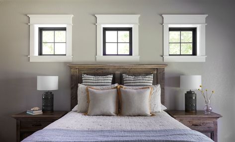 Black Windows With White Trim Creates A Classic Look Trim For Black Windows, Window Above Bed, Bifold Patio Doors, Interior Window Trim, Fiberglass Windows, Interior Window, High Windows, Square Windows, Black Window