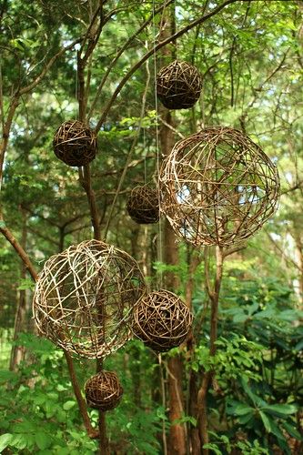 Wooden balls hanging garden art | Karl Gercens | Flickr Hanging Garden Art, Twig Art, Witch Garden, Garden Deco, Hanging Garden, Garden Art Sculptures, Garden Structures, Wooden Garden, Outdoor Art