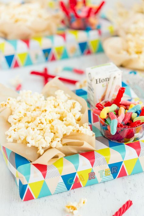 Easy Movie Night Box Craft: this colorful box doubles as a craft for the kids and a fun way to carry their treats for family movie night! Fill their personalized movie night box with their favorite goodies. . #movienight #kidscrafts #kids #madetobeamomma Movie Night Ideas For Kids, Christmas Movie Night Ideas, Superhero Party Food, Movie Night Party Ideas, Family Movie Night Snacks, Movie Night Box, Birthday Movie Night, Night Party Ideas, Diy Movie Night