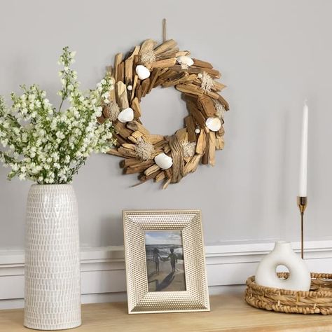 Natural Driftwood and Seashell Artificial Wreath - 14" - Bed Bath & Beyond - 40003197 Material Wreaths, Driftwood Crafts, Artificial Wreath, Christmas Central, Coastal Interiors, Wreath Designs, Neutral Colour Palette, Natural Jute, Coastal Style