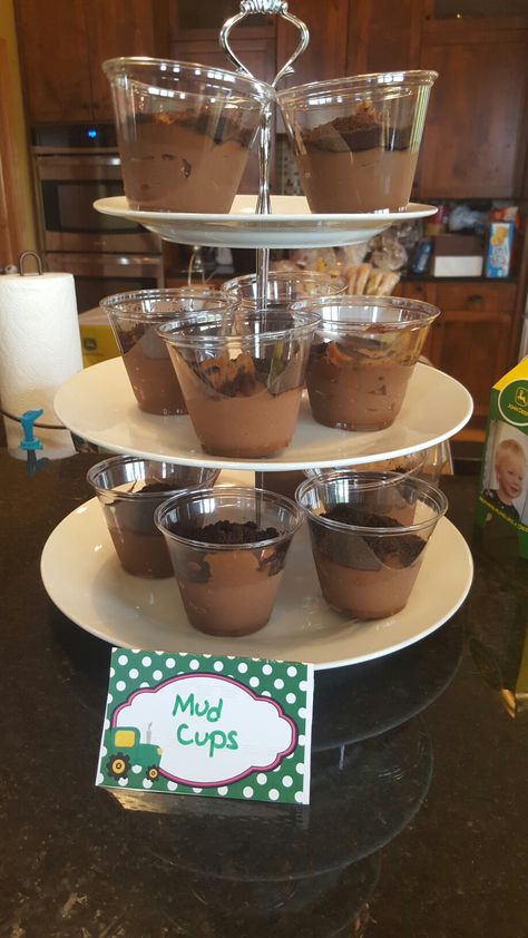 Mud cups for tractor party Barnyard Birthday Games, Udderly In Love, Farm Themed Birthday Party Activities, Mid Afternoon Party Food, My First Rodeo Birthday Party Food Ideas, Farming Birthday Party, My First Rodeo Food Ideas, Cow Themed Graduation Party, Cow Graduation Party