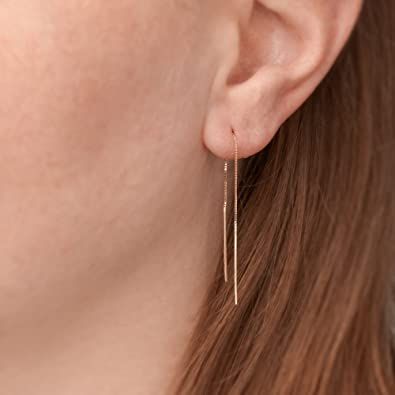 These long drop earrings gold with sleek design, these linear drop earrings add a feminine accent to any style. Pair them with your casual or formal attire. Dangly Gold Earrings, Black Onyx Hoop Earrings, Minimalist Gold Earrings, Gold Threader Earrings, Circle Charm Necklace, Jewelry Presentation, Black Diamond Earrings Studs, Threader Earrings Gold, Bridal Party Jewelry