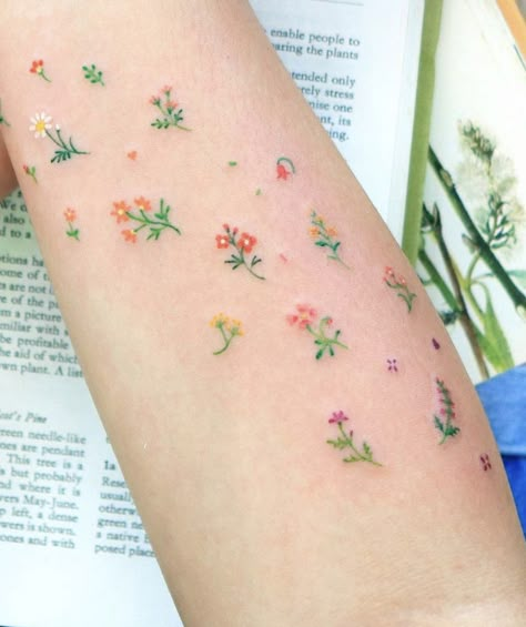 @ovenlee.tattoo Ovenlee Tattoo, Pastel Tattoo, Small Colorful Tattoos, Tiny Flower Tattoos, Kpop Tattoos, Cute Matching Tattoos, Garden Tattoos, Wildflower Tattoo, Pretty Hand Tattoos