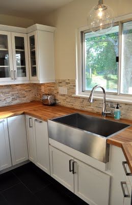 Butcher block countertops and stainless apron sink. Stainless Apron Sink, Farmhouse Kitchen Countertops, Ikea Style, Stainless Steel Farmhouse Sink, Wood Countertop, Butcher Block Counter, Apron Sink, Stainless Kitchen, New Countertops